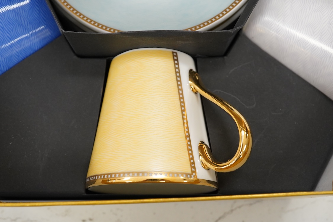 A Royal Collection of Faberge set of six bone china cups and saucers, boxed